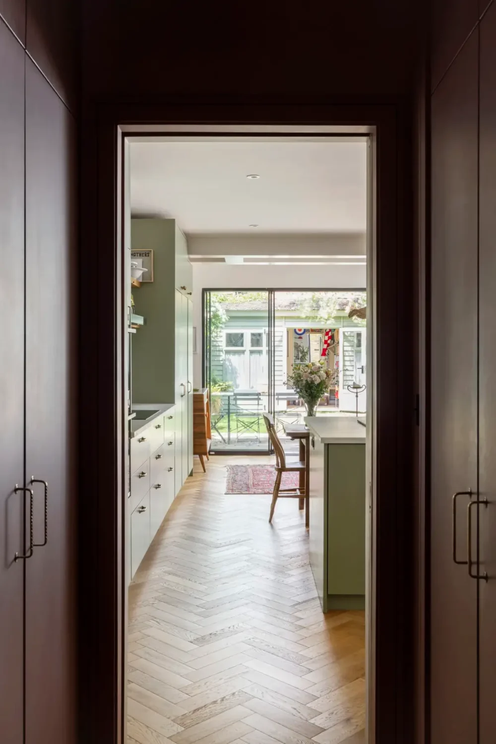 A Beautiful Extended Victorian House in Queen's Park 11 small hall built-in wardrobes green kitchen