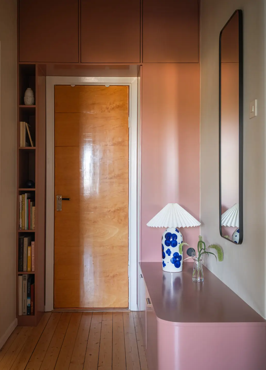 Stylish Small Entryway Ideas with Smart Storage Solutions 8 small hall with pink cabinets around front door nordroom Stylish Small Entryway Ideas with Smart Storage Solutions