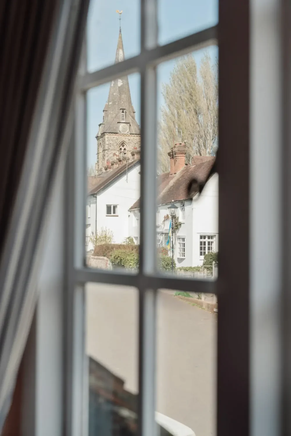 A Historic English Cottage Decorated in Pink & Blue Tones 19 street view english cottage