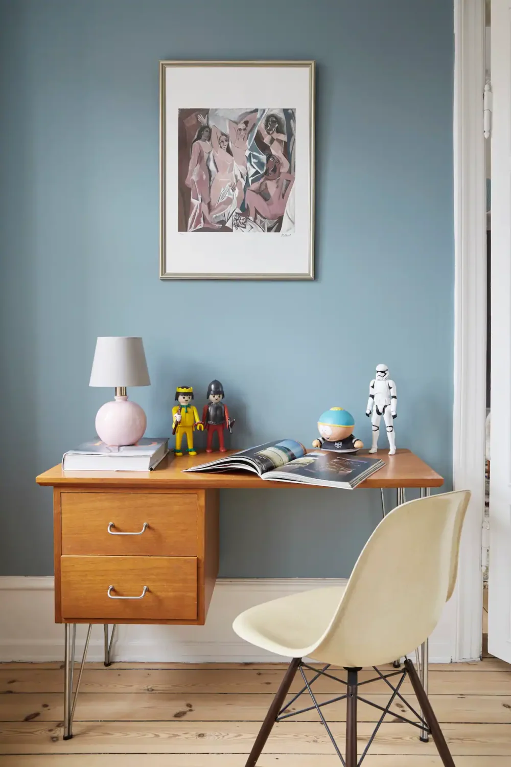 You Can Stay in This Colorful Design Apartment in Copenhagen 6 wooden desk with light blue wall