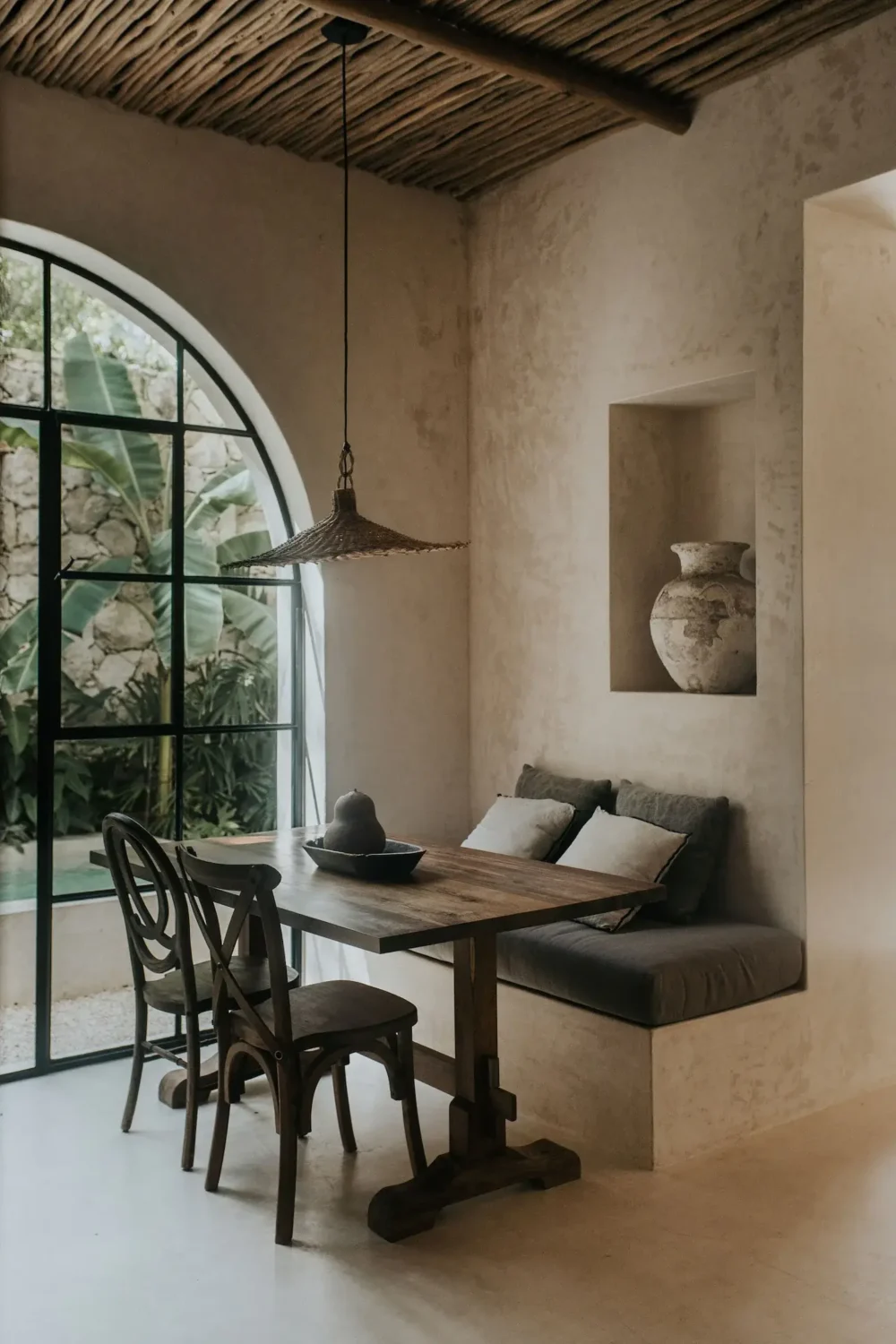 Rustic Wooden Elements in a Stylish Tulum Airbnb 11 wooden-dining-table-built-in-bench-wooden-ceiling-airbnb-home-tulum-nordroom